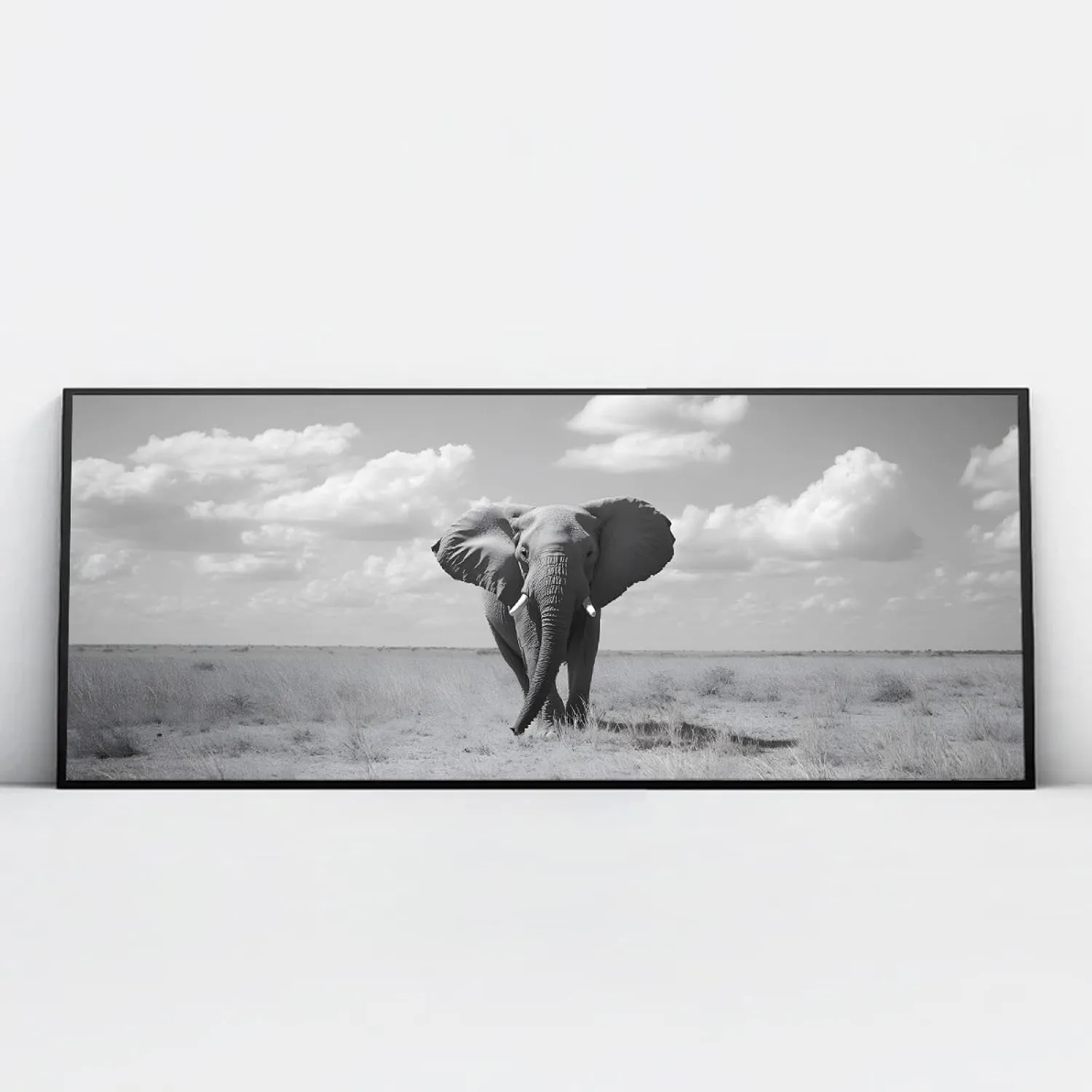 LAIZIHOME Black and White Style Canvas Picture Print Beautiful Sky over African Grasslands Running Elephants Poster Painting Animal Wall Art for Indoor Home Decor 12X30inch With-Black-Frame